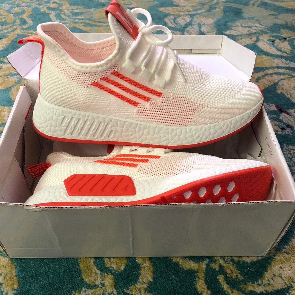 White and orange sneakers